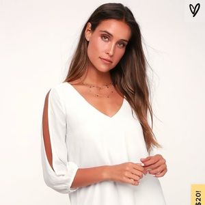 White dress with keyhole sleeves
